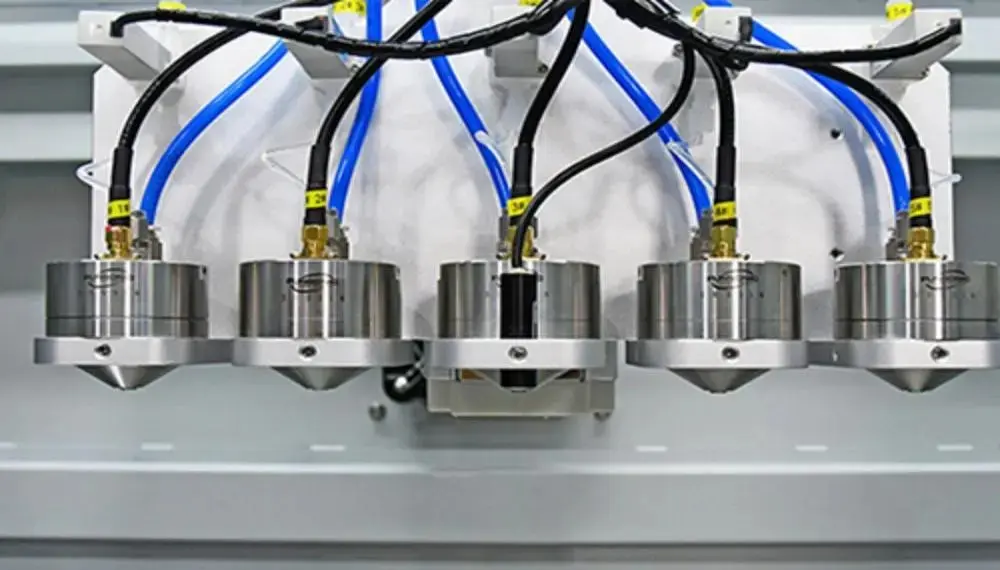 From droplets to thin films: process optimization in ultrasonic spraying